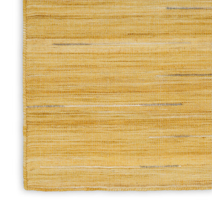 Rectangular golden-yellow woven rug with subtle horizontal stripes and textured natural fiber.