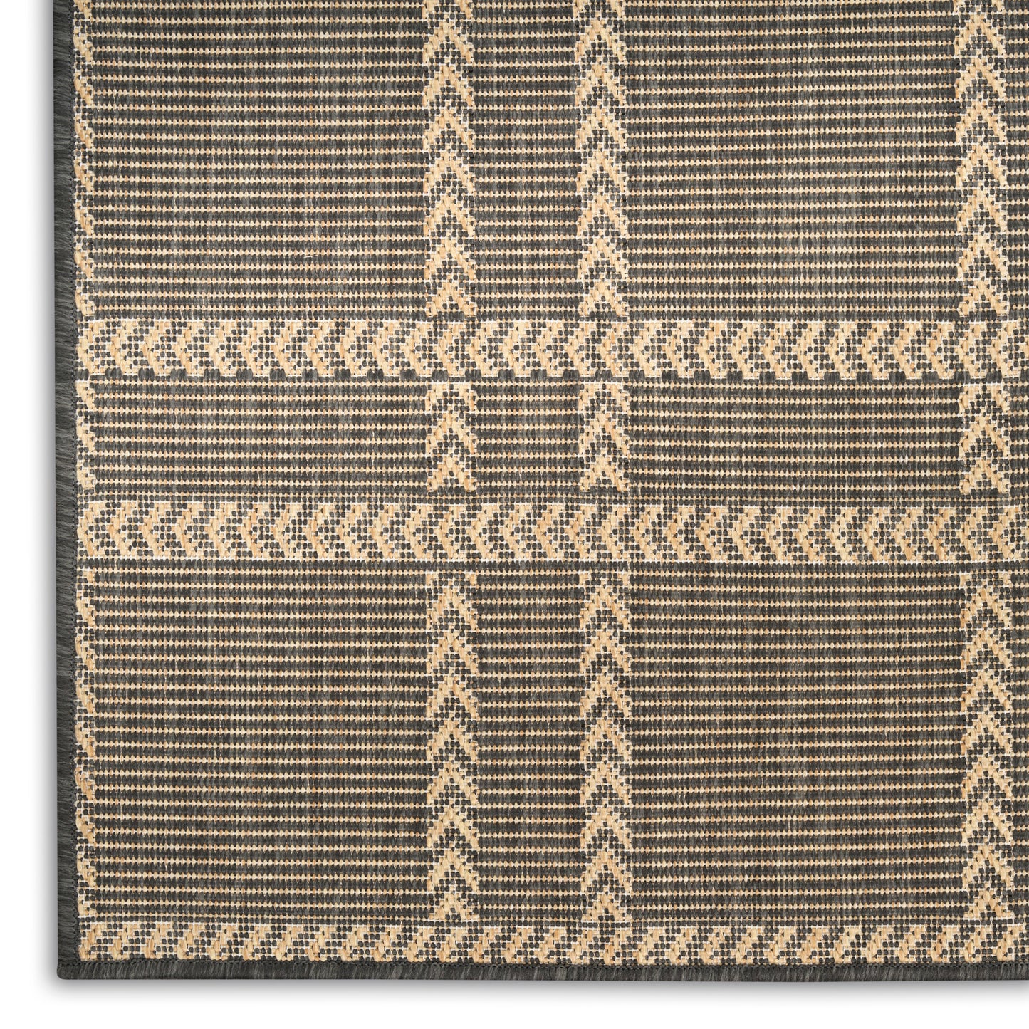 Beige and charcoal woven rug with plaid chevron panels and natural fiber texture.