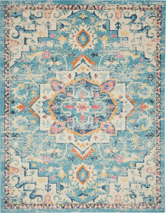 Pastel teal and cream oriental rug with central medallion, peach and pink accents, distressed floral border.