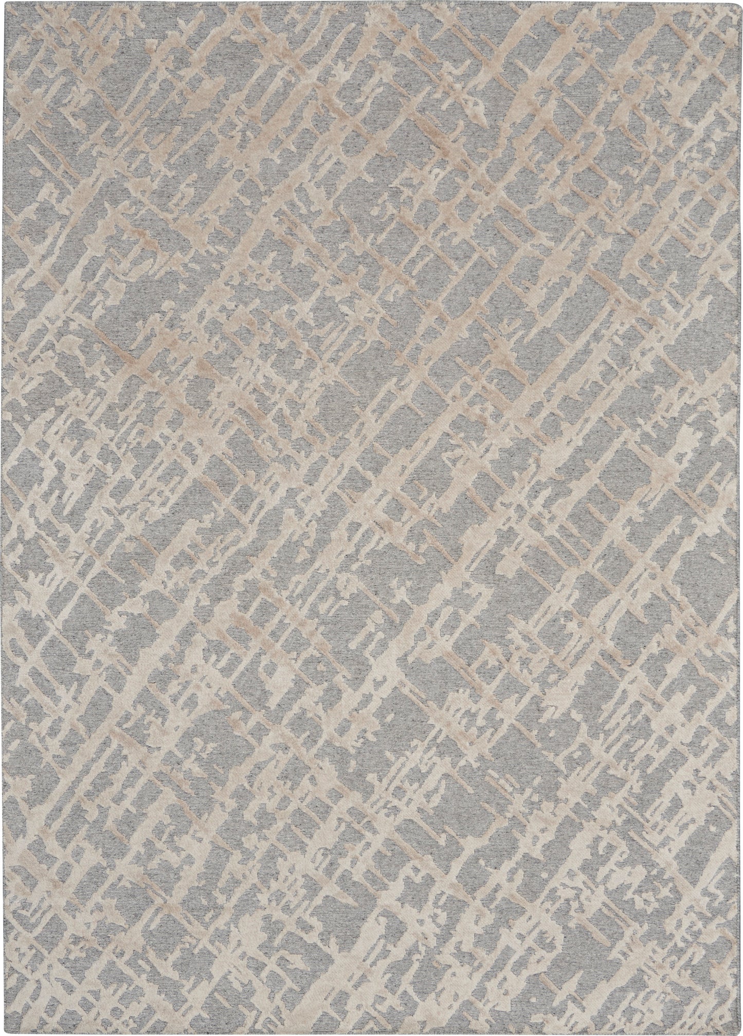 Rectangular gray area rug with beige diagonal lattice pattern; soft, textured woven look for modern living spaces.
