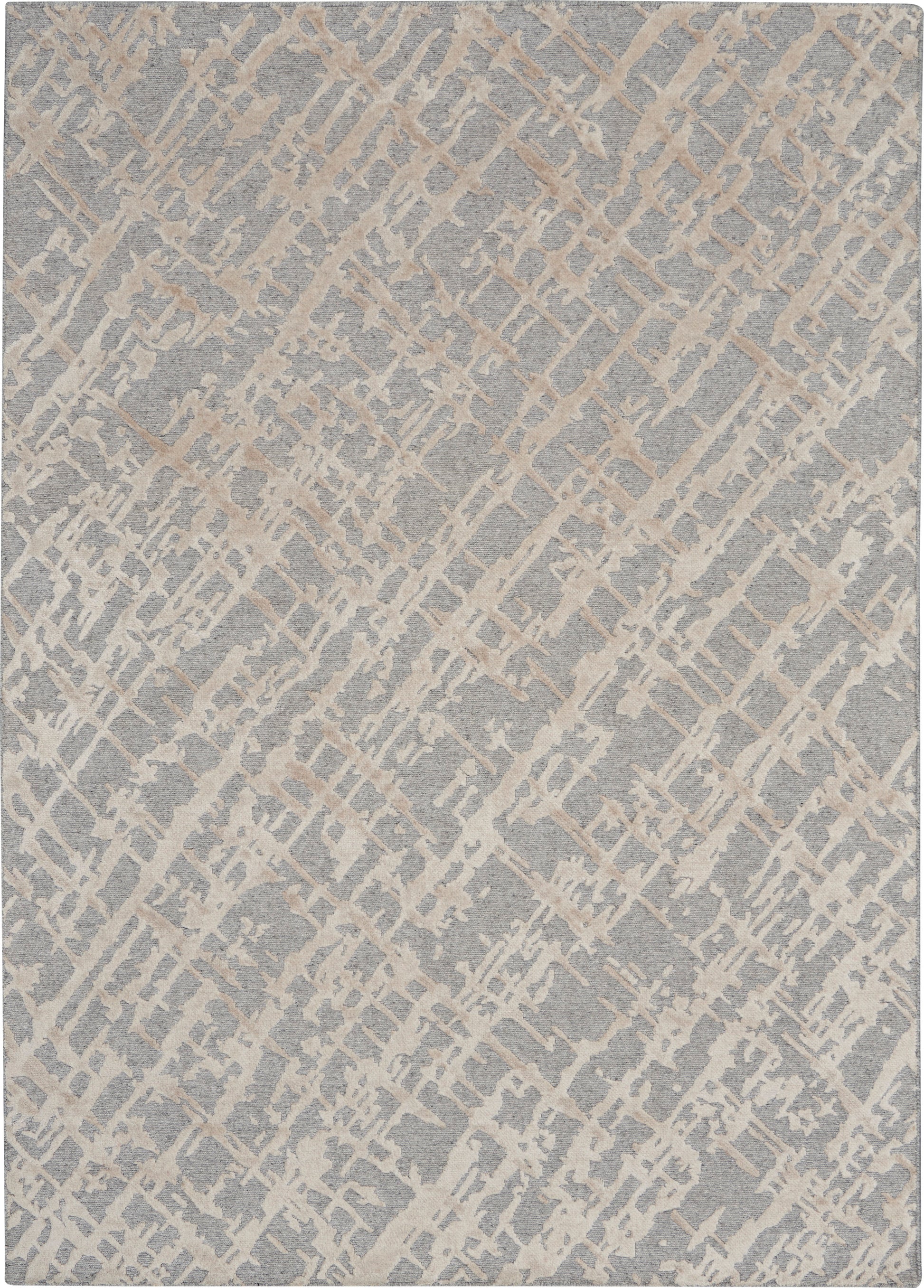 Rectangular gray area rug with beige diagonal lattice pattern; soft, textured woven look for modern living spaces.