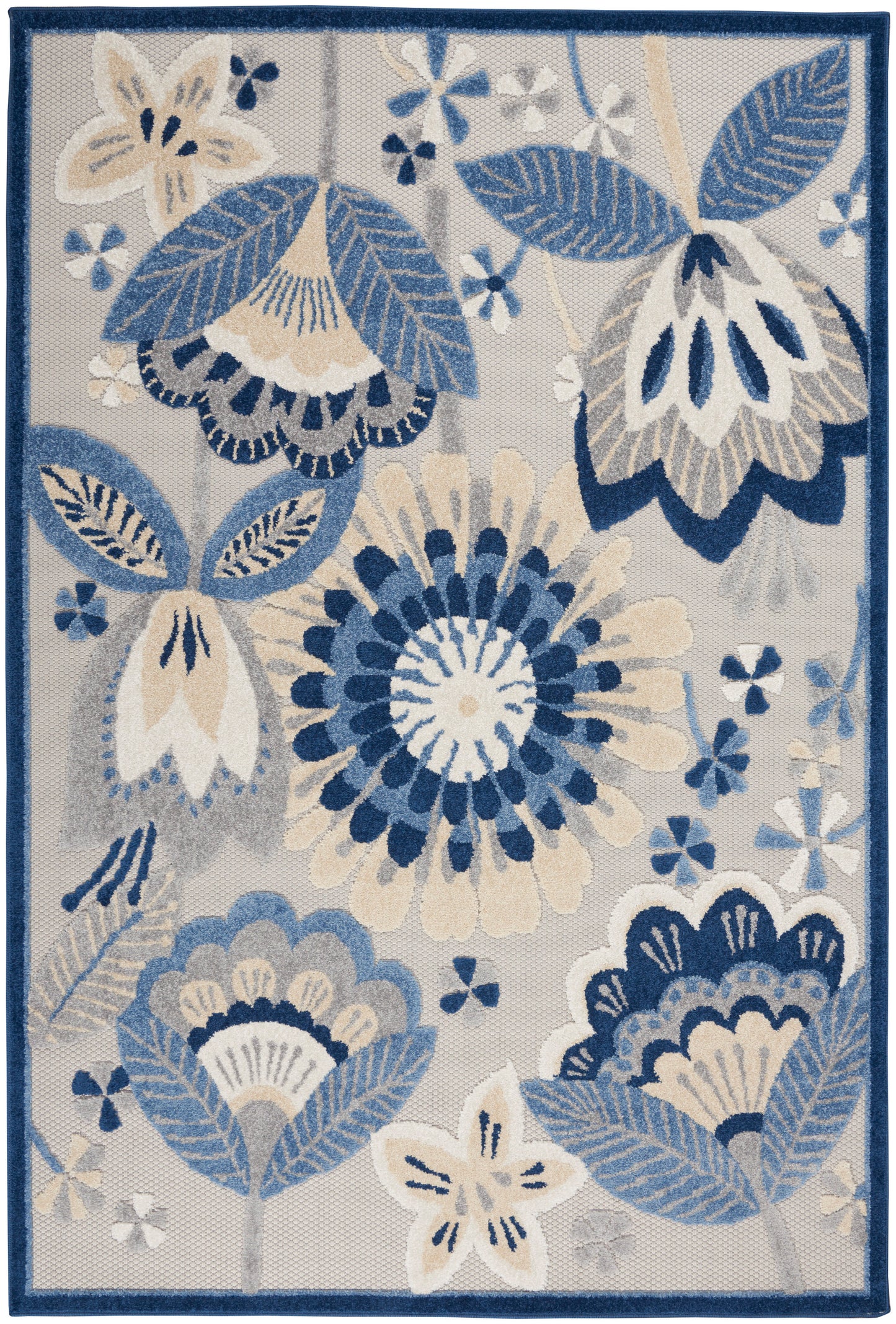Blue and ivory floral area rug with large blossoms and leaves on a light gray field, bordered in navy.