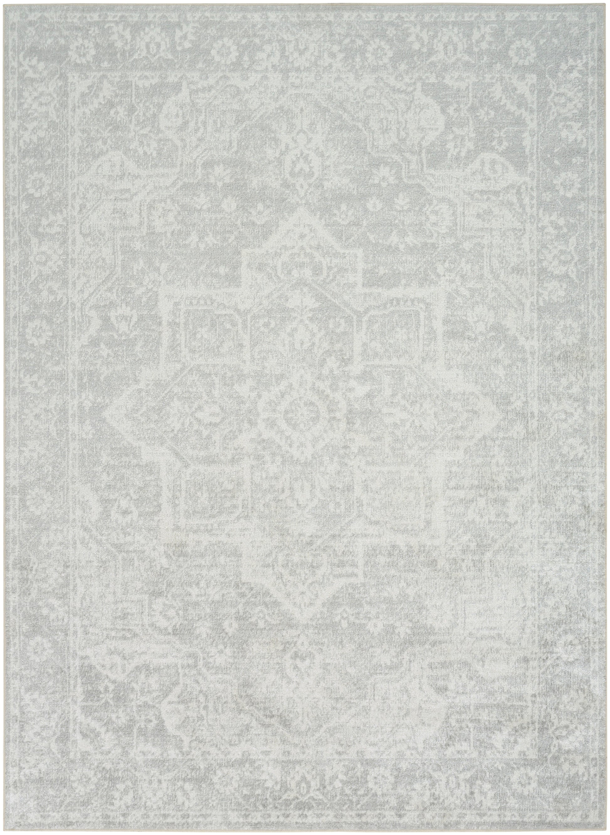 Light gray distressed oriental rug with a faded medallion pattern; vintage decorative floor covering.
