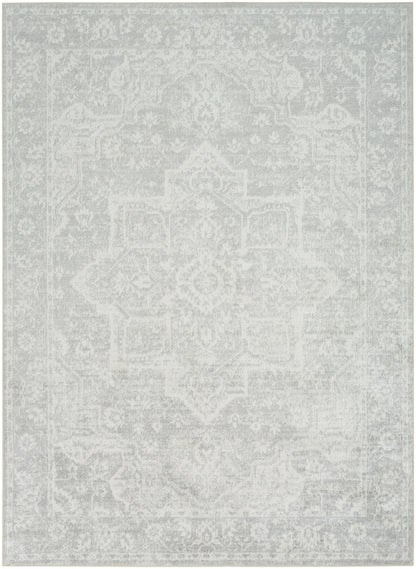 Light gray distressed oriental rug with a faded medallion pattern; vintage decorative floor covering.