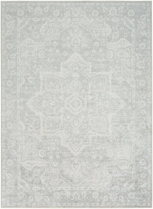 Light gray distressed oriental rug with a faded medallion pattern; vintage decorative floor covering.
