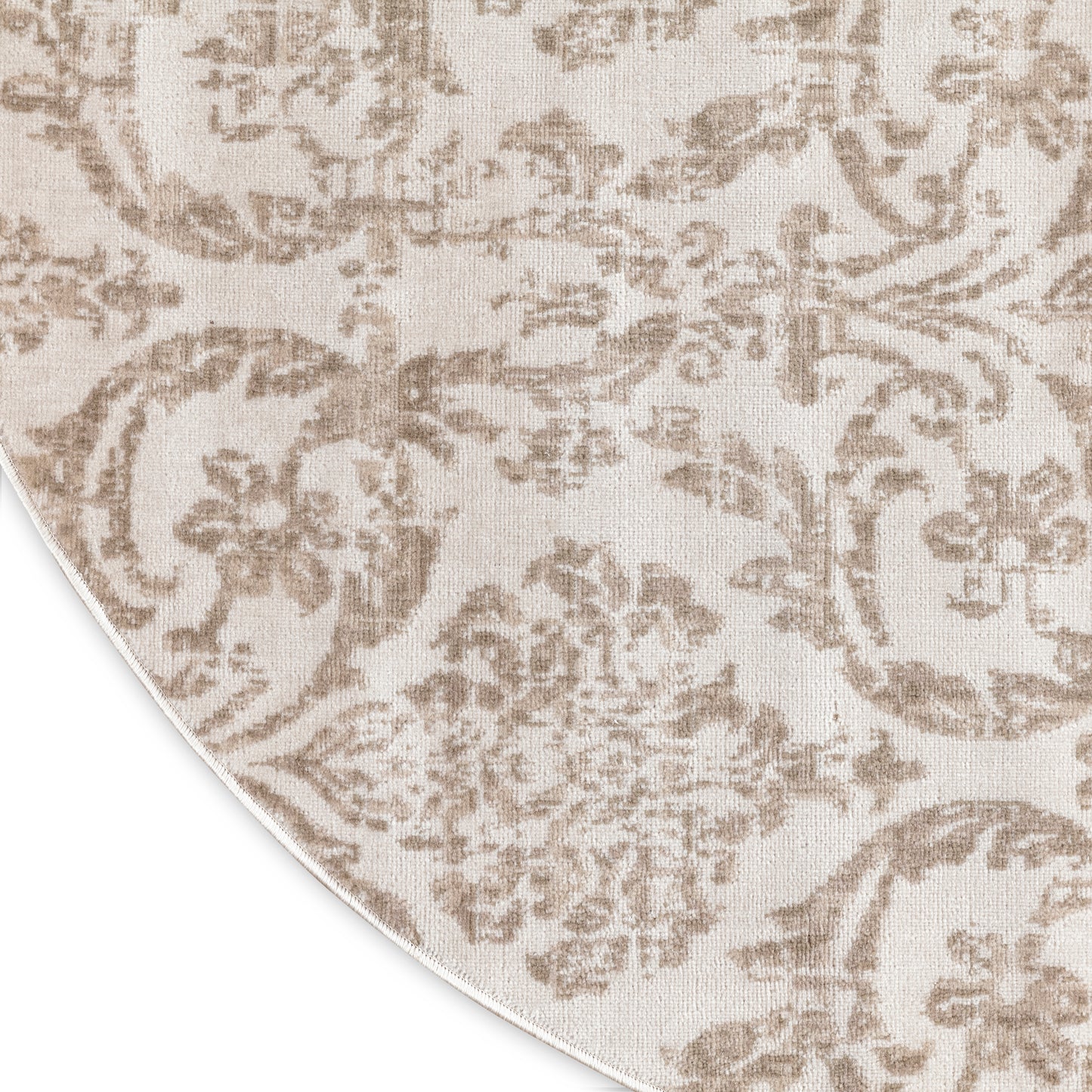 Beige damask patterned rug with taupe floral motifs, round 5 ft diameter.