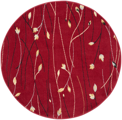 Round red rug with slender black and white branches and small beige leaves.