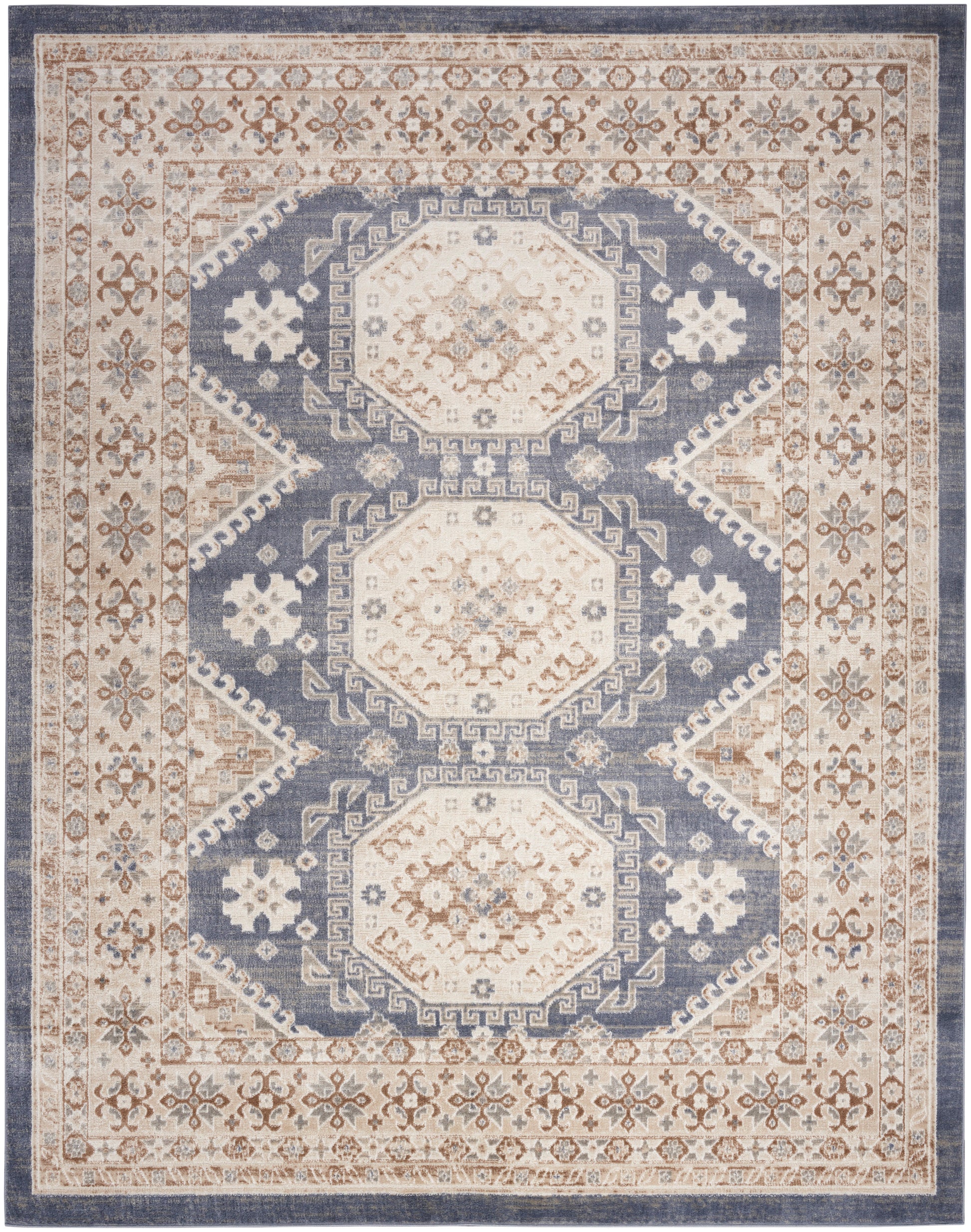 Blue and ivory oriental rug featuring three ivory octagonal medallions, tan floral border, Persian-inspired vintage design.