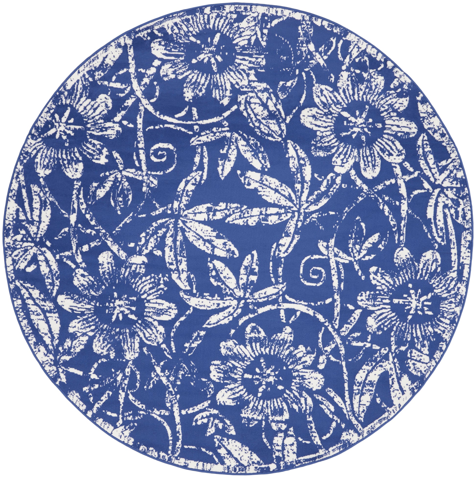 Round blue rug with a white floral pattern and a central pale blue rectangle overlay.