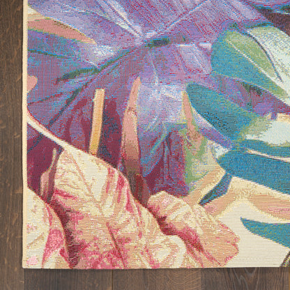Cotton woven wall tapestry with oversized pink, purple and teal tropical leaves on a cream background.