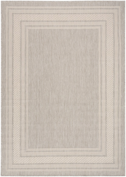 Beige rectangular rug with layered cream borders and subtle woven texture; neutral, versatile floor covering.