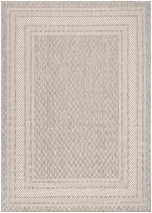 Beige rectangular rug with layered cream borders and subtle woven texture; neutral, versatile floor covering.
