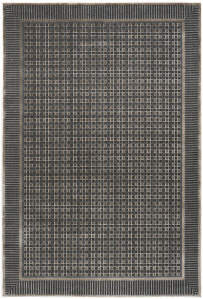 Charcoal flat-weave rug with tan square-grid pattern and striped borders; modern geometric look.
