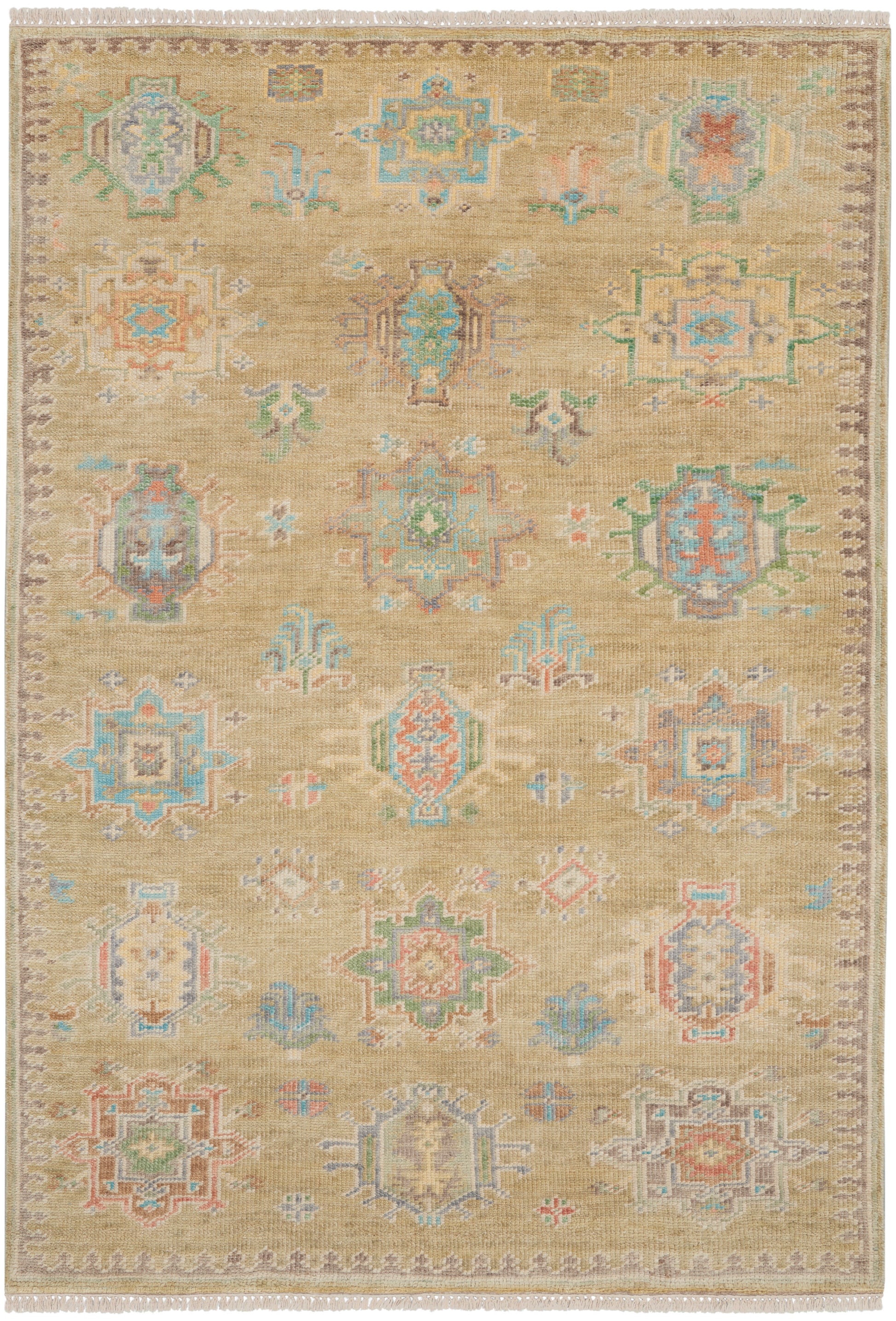 Beige oriental rug with pastel geometric medallions in blue, pink and green; fringed ends, vintage/antique style.