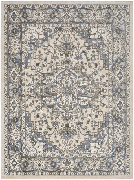 Intricate oriental rug with central medallion, ivory and blue-gray tones, floral motifs and decorative border.