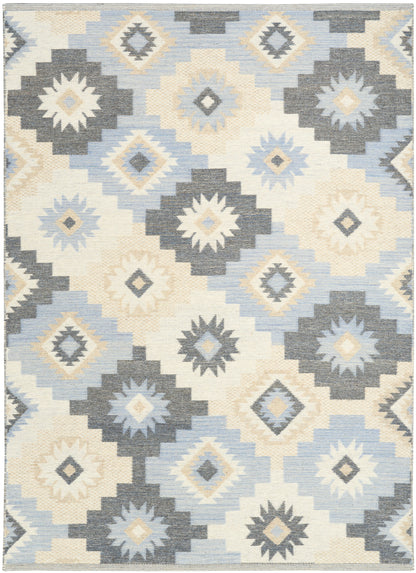Rectangular kilim-style rug with cream, light blue, and gray diamond star motifs in a stepped geometric pattern.