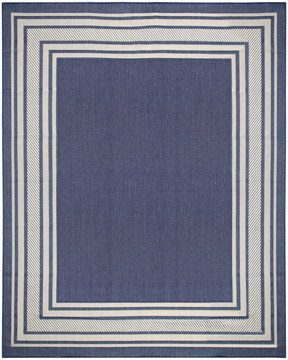 Navy blue rectangular woven rug with cream nested borders forming a geometric frame.