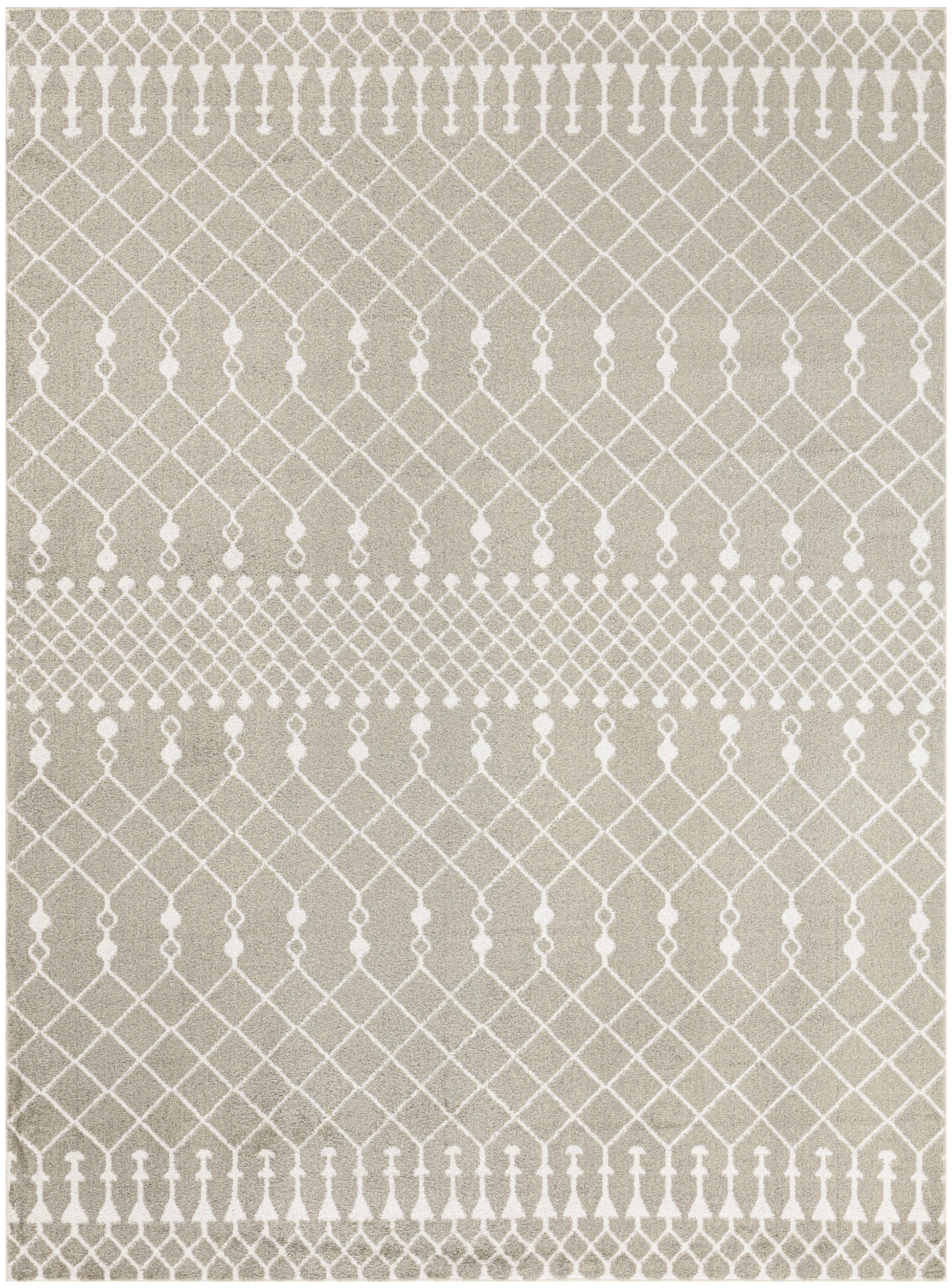 Beige rug with white diamond lattice and vertical dot motif bands; modern geometric, neutral living room decor.