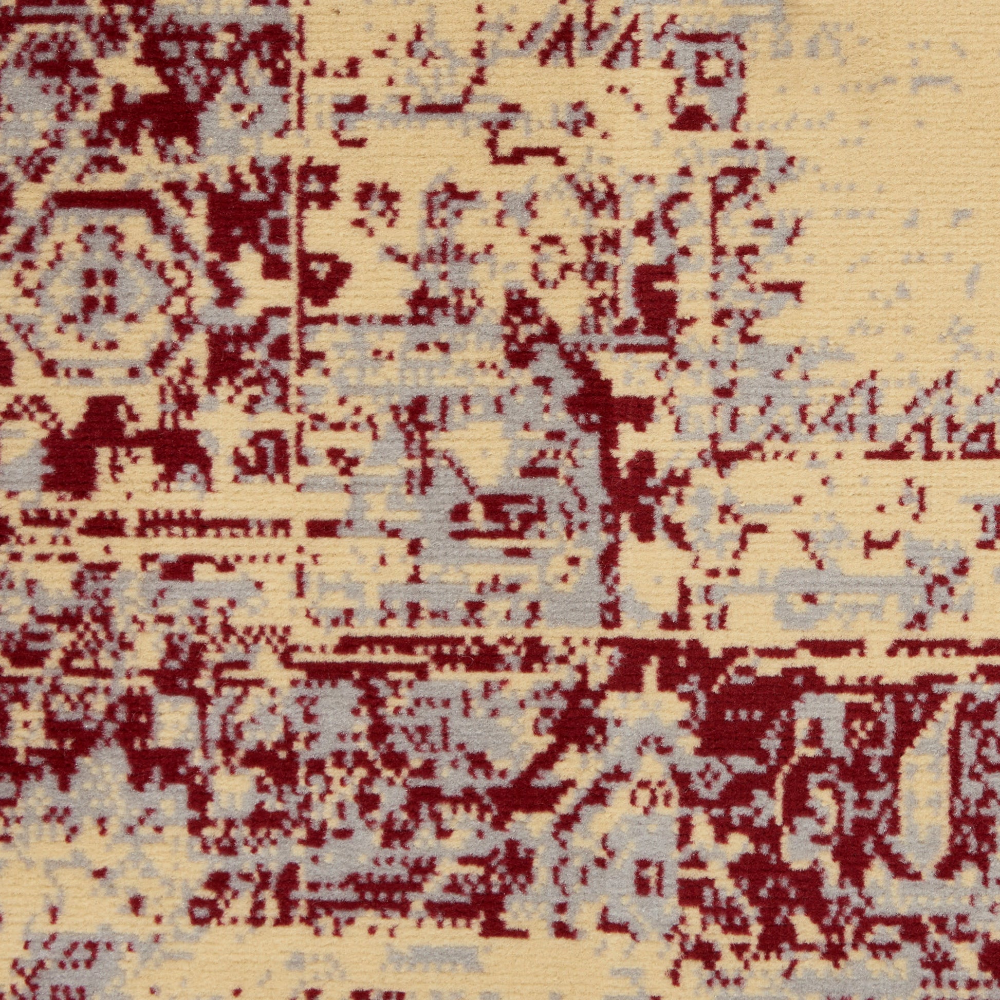 Beige distressed oriental runner rug with burgundy motifs and pale gray-blue accents, vintage-inspired.