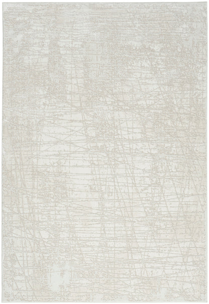 Rectangular ivory area rug with a soft beige distressed abstract linear pattern and subtle texture.