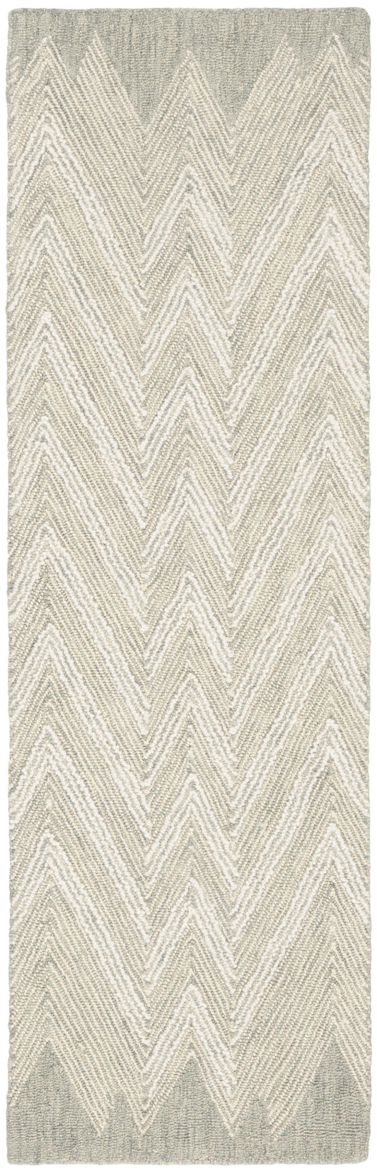 Beige and gray chevron rug runner with textured boucle weave; neutral hallway or living room decor.