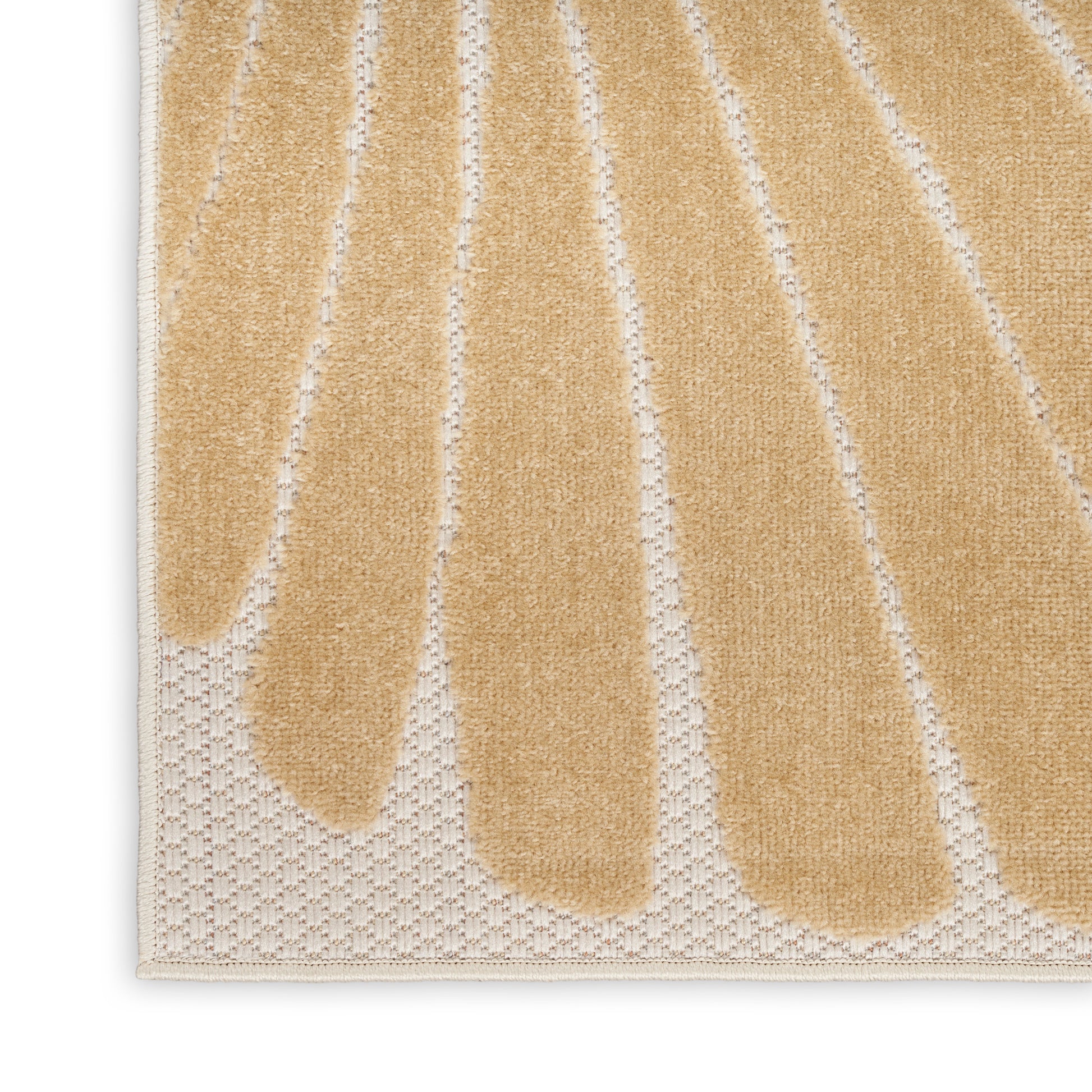 Tan palm-leaf rug on cream textured base, rectangular with white stitched border.