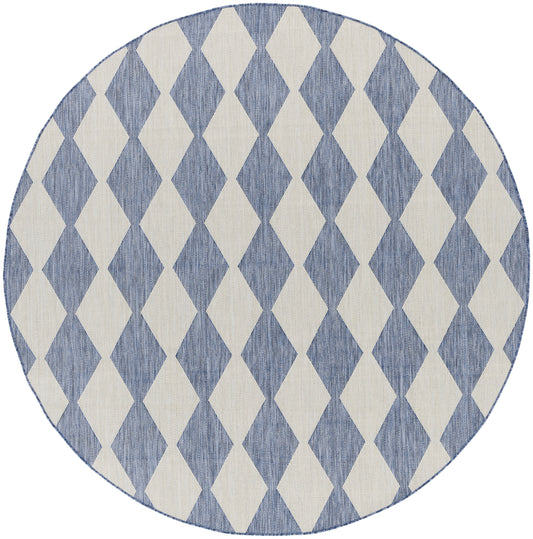 Round rug with blue and ivory diamond harlequin pattern, woven texture.