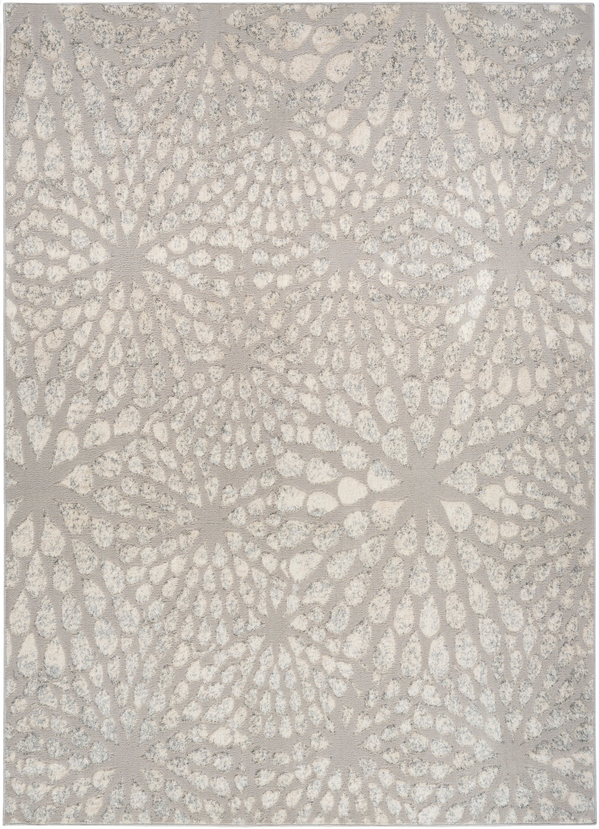 Neutral beige rug with subtle gray sunburst floral motifs; textured tufted surface for living room decor.