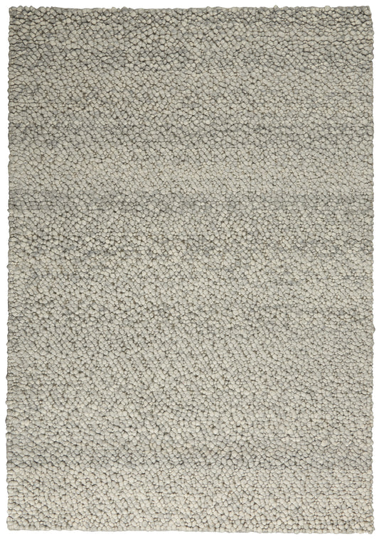 Beige textured shag rug with dense loop-pile; rectangular plush area rug for living spaces.