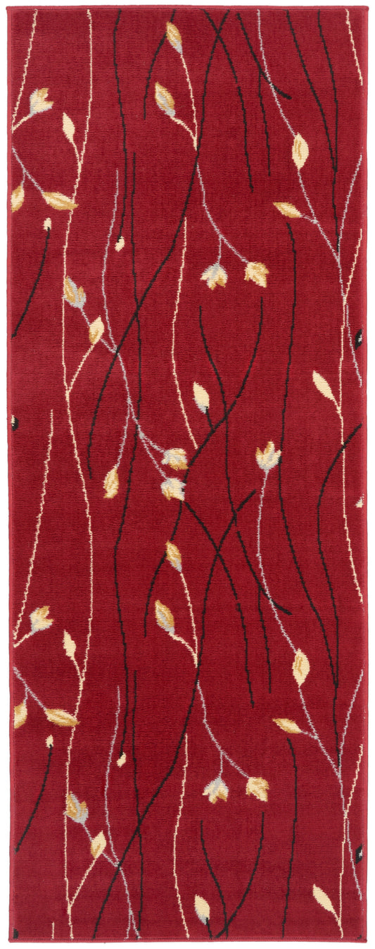 Red rectangular runner rug with black and white winding vines and small yellow-gold leaves.