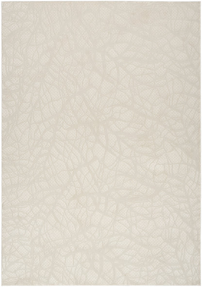 Beige rug with a subtle modern pattern; neutral backdrop.