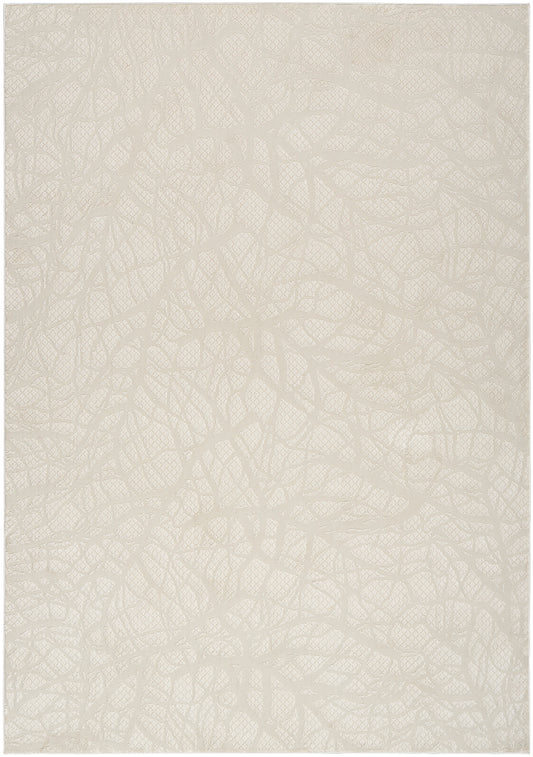Beige rug with a subtle modern pattern; neutral backdrop.