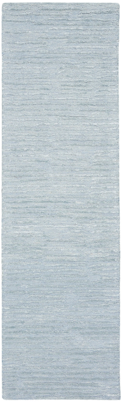 Soft blue-gray shag rug runner with plush textured pile, ideal for hallway or living room.