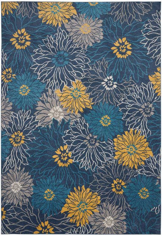 Rectangular floral area rug (9' x 12') with a bold blue background and teal, gray, white-outlined flowers accented in mustard yellow.