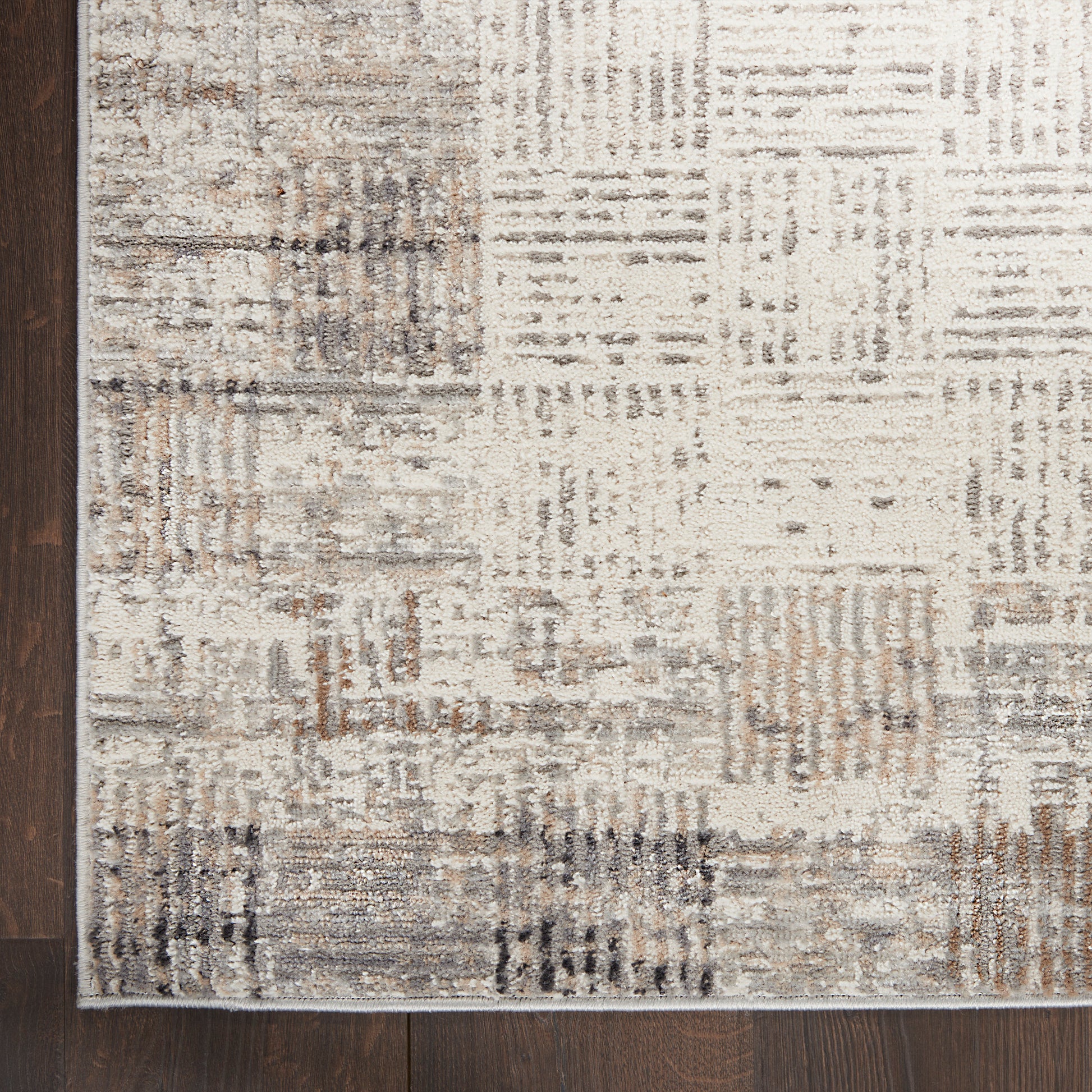 Neutral patchwork area rug, 9' x 12', in cream, beige, taupe and gray; woven low-pile with abstract rectangle pattern, modern decor.