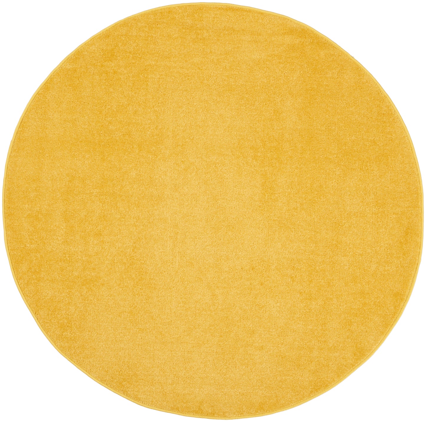 Round mustard yellow outdoor rug with plush velvet texture; suitable for outdoor spaces.