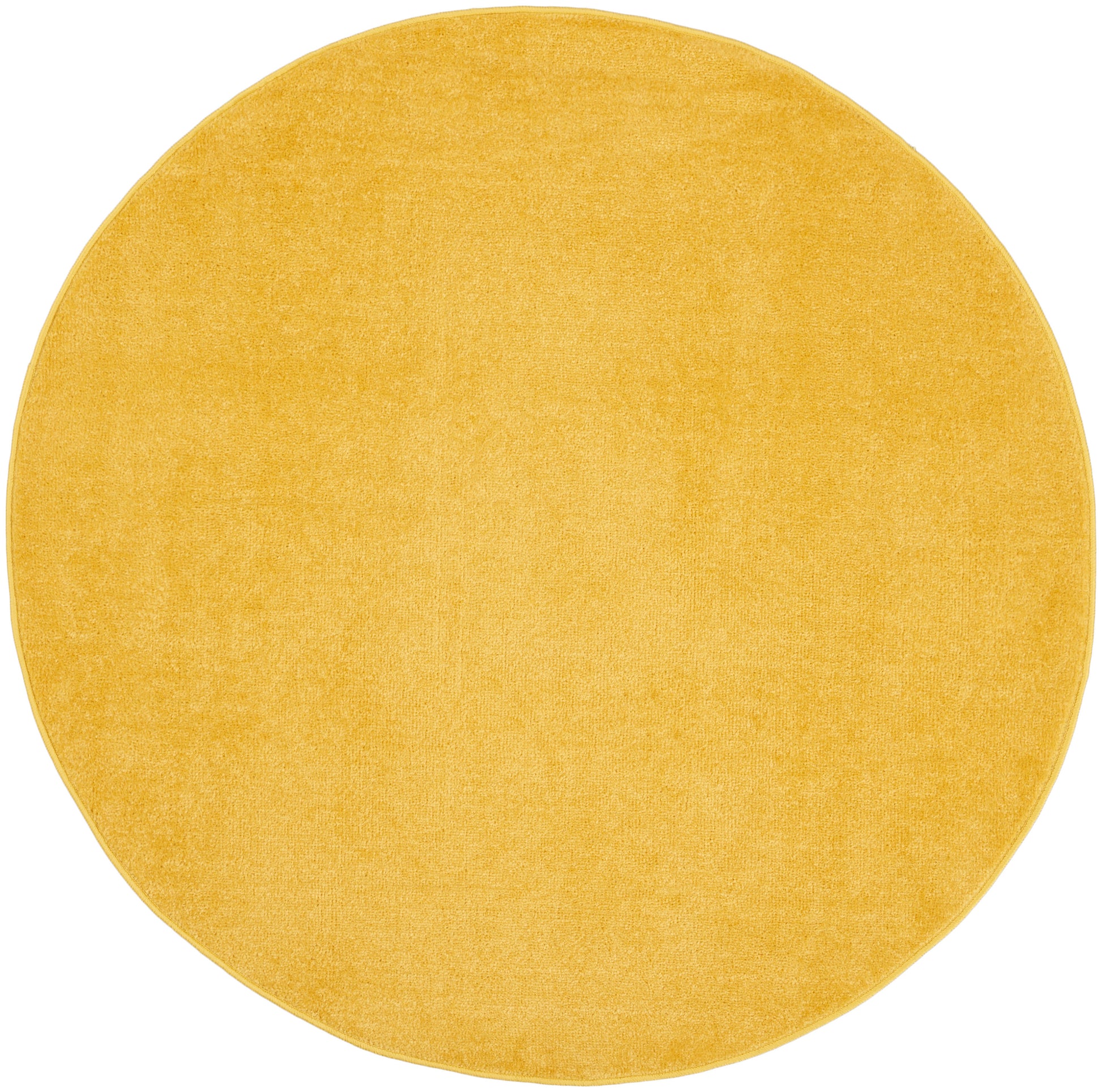 Round mustard yellow outdoor rug with plush velvet texture; suitable for outdoor spaces.