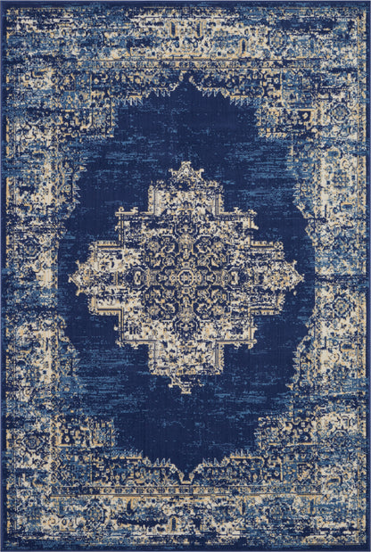 Distressed navy blue Persian-style area rug with beige antique medallion motif.