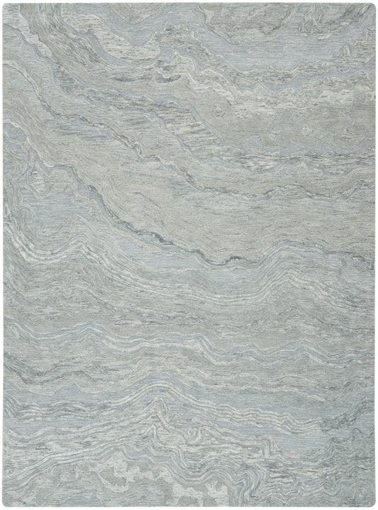 Rectangular light gray-blue area rug with marbled, wavy pattern and subtle texture; modern, versatile decor piece.