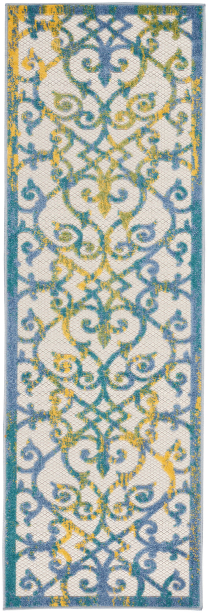 Narrow decorative rug runner with ornate blue & yellow scrolling pattern on ivory background, teal border.