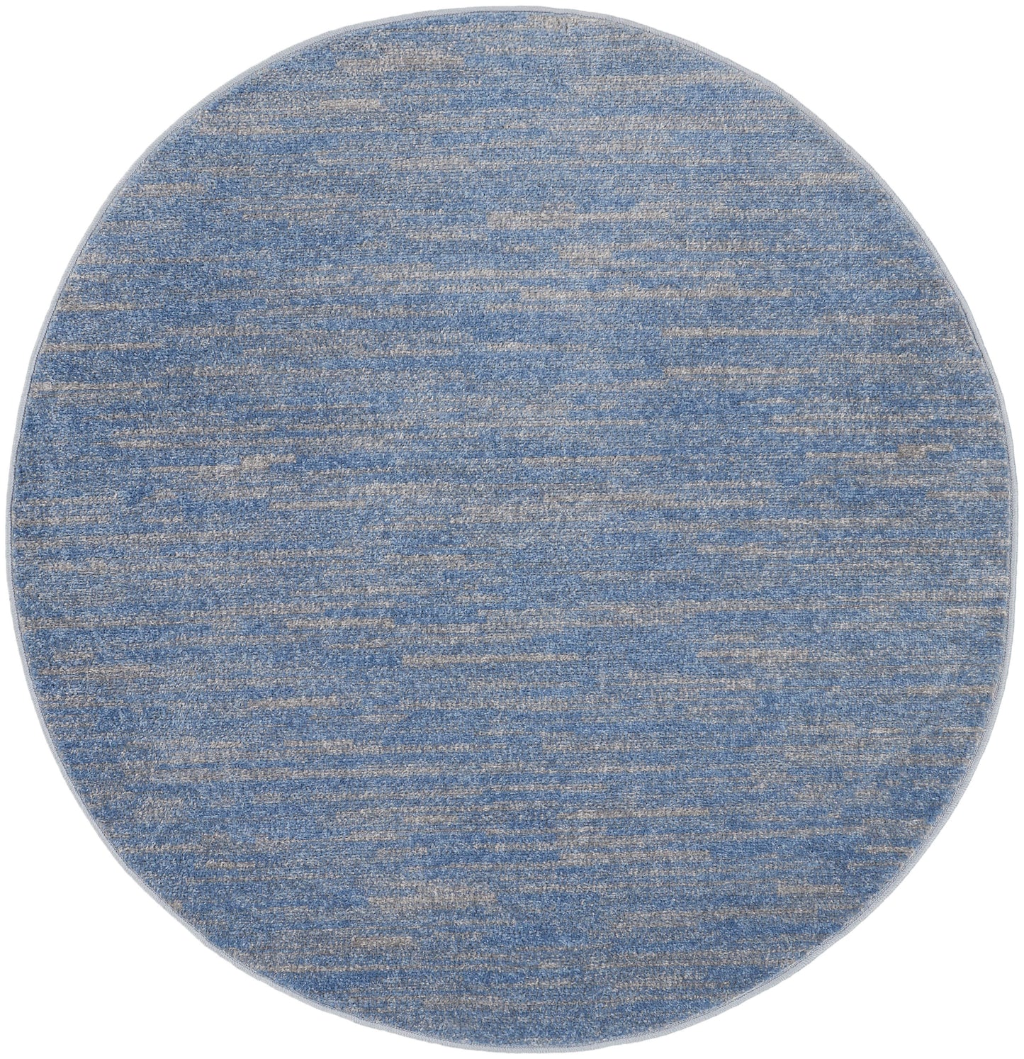 Round blue heathered rug with beige flecks; soft woven texture for living spaces.