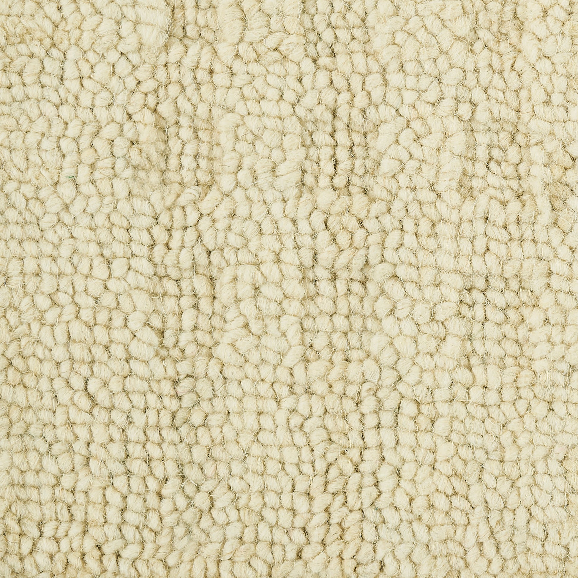 Cream boucle rug with dense loop pile; plush beige texture for cozy living spaces.