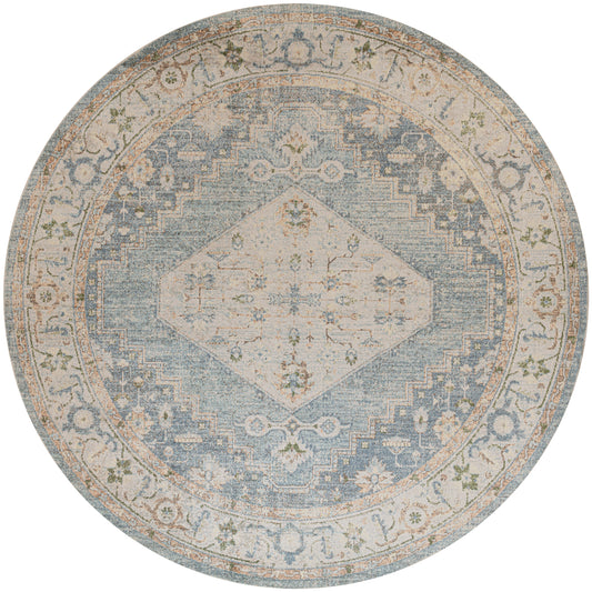 Round vintage-inspired rug with pale blue center diamond motif, beige border and muted floral accents.