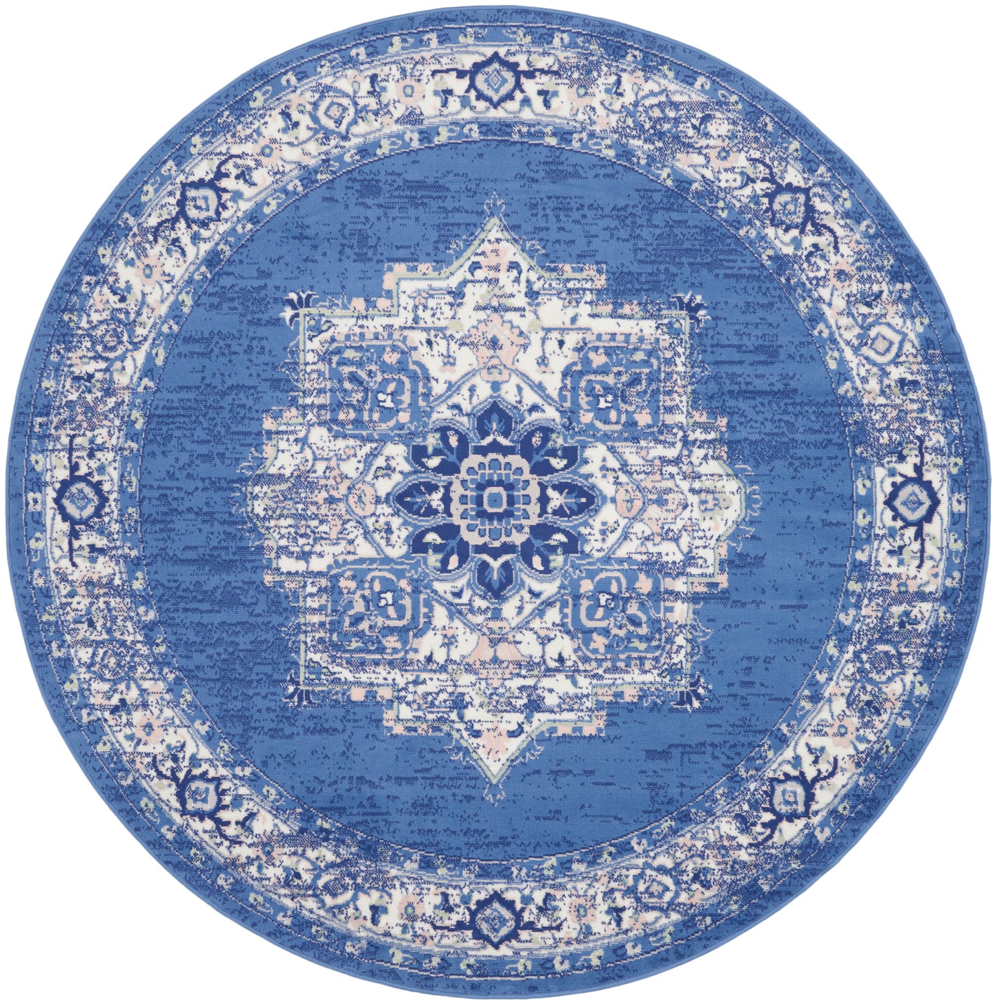 Round blue rug with a distressed white oriental medallion and ornate border.