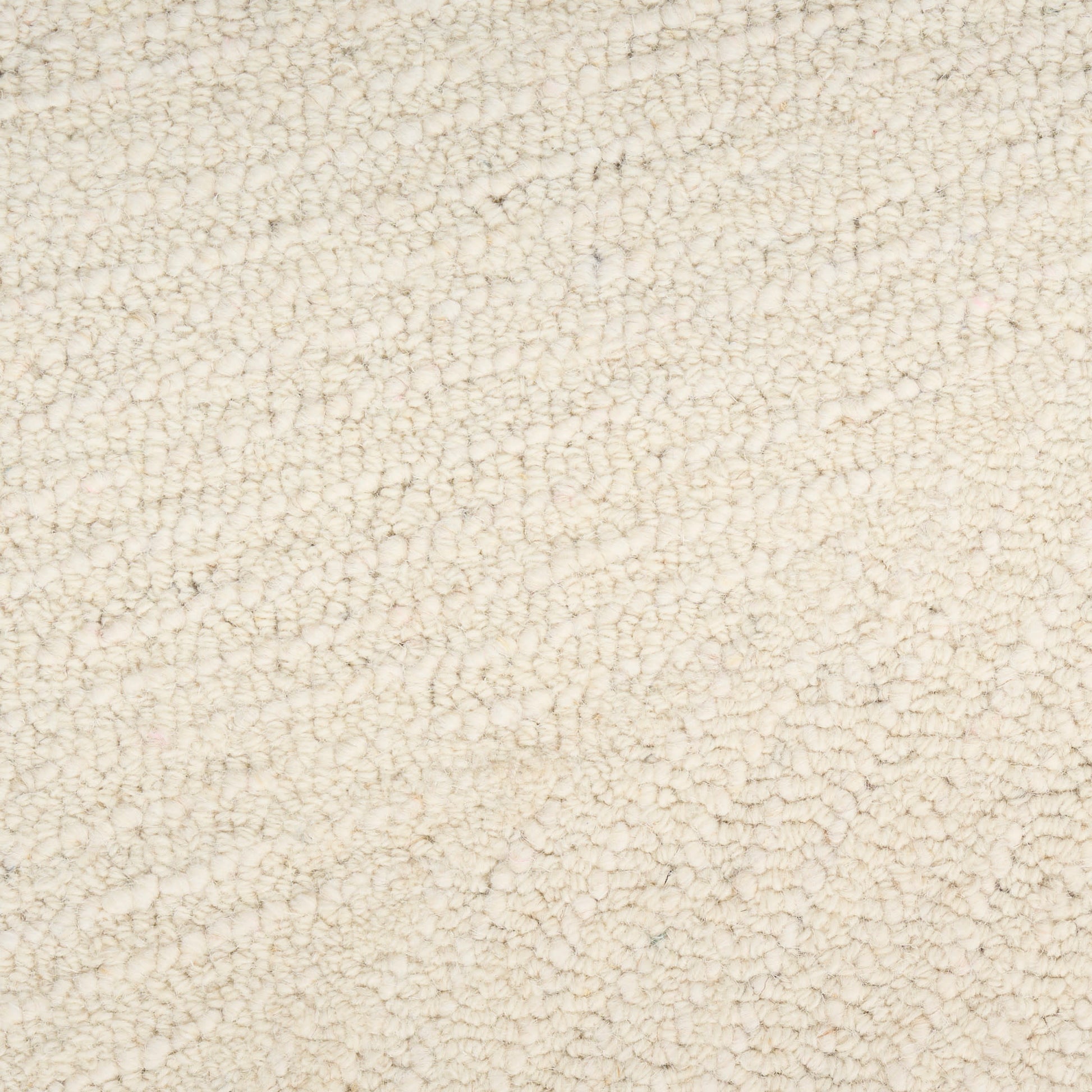 Beige plush rug texture with a dense loop pile; warm neutral floor covering.