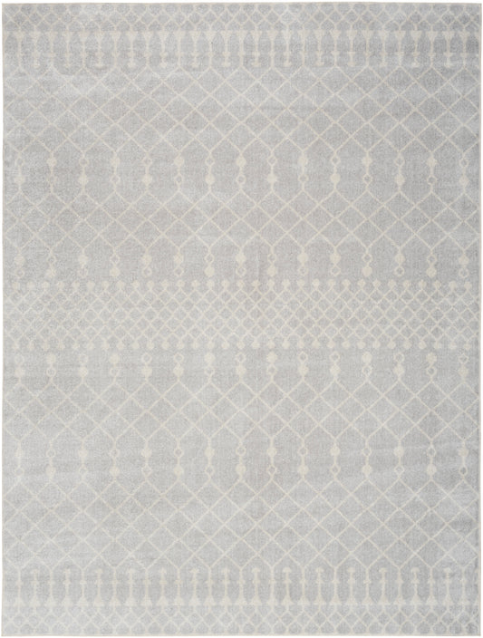 Light gray area rug with subtle white geometric lattice & diamond motifs; modern, soft textured floor covering.
