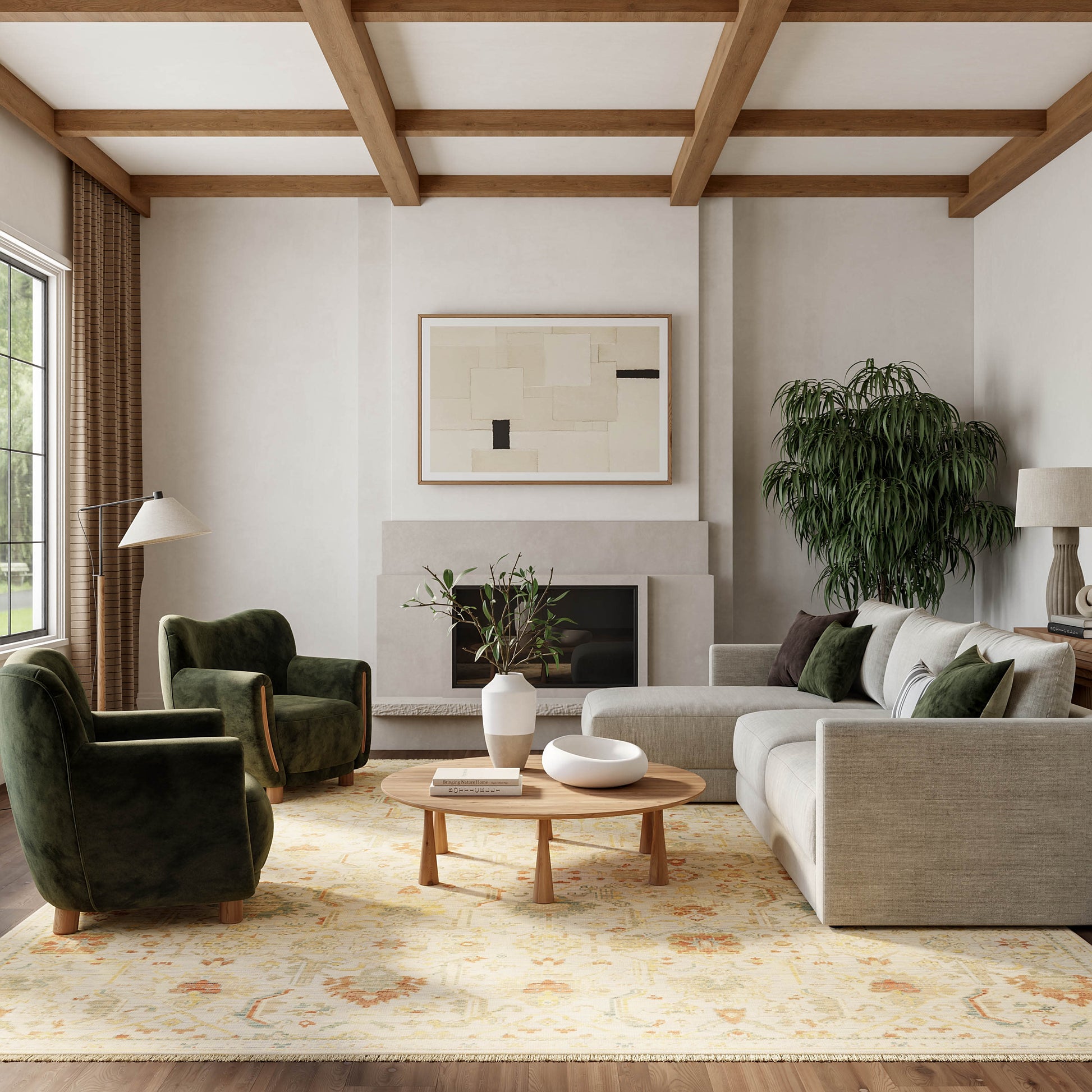 Living room scene featuring a vintage rug (6' x 9') along with two green velvet armchairs, a beige sofa, a round wood coffee table, a plant and a fireplace.
