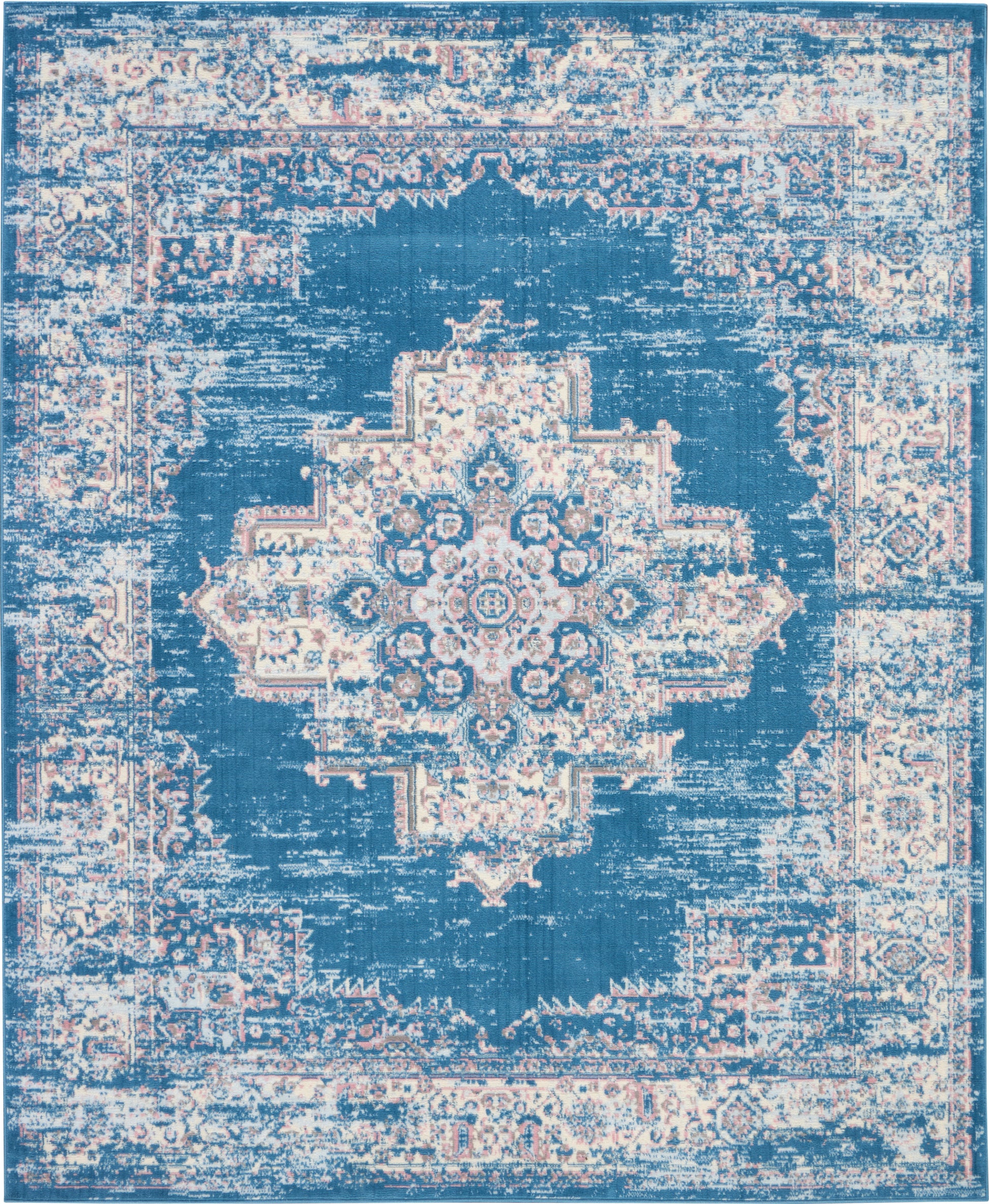 Blue distressed oriental rug with cream central medallion and ornate light border, vintage worn look.