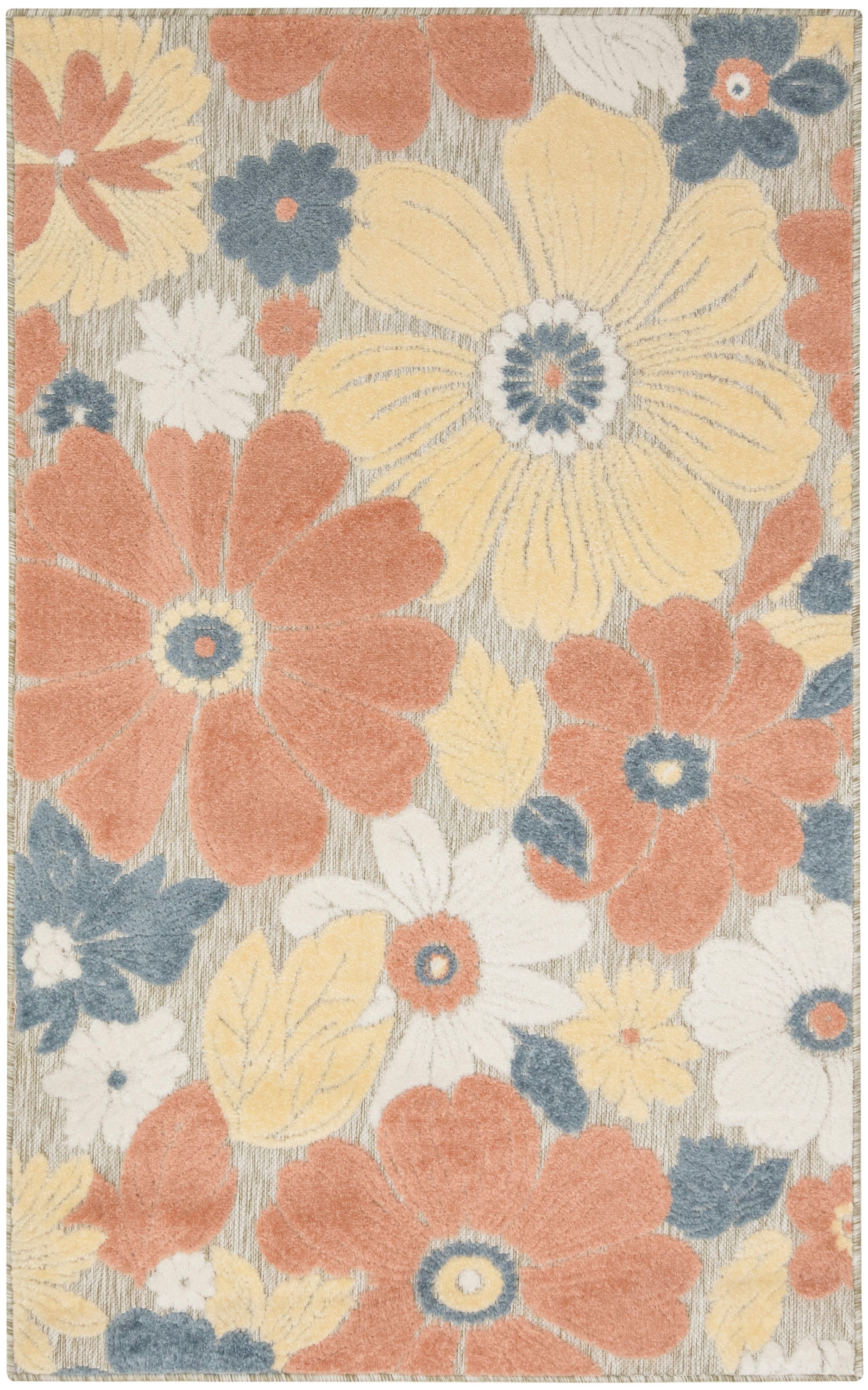 Floral area rug with large coral, yellow & blue blooms on a beige background; soft woven textile for living room decor.