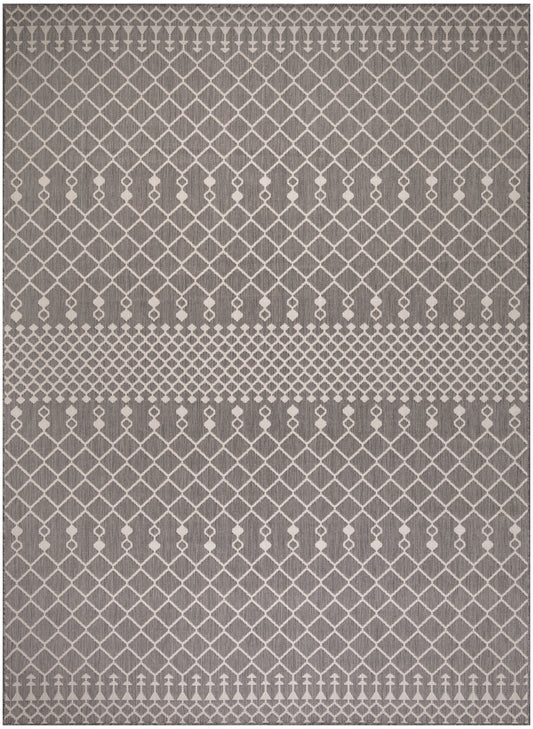Grey area rug with white diamond lattice pattern and a central dotted stripe for a modern neutral look.